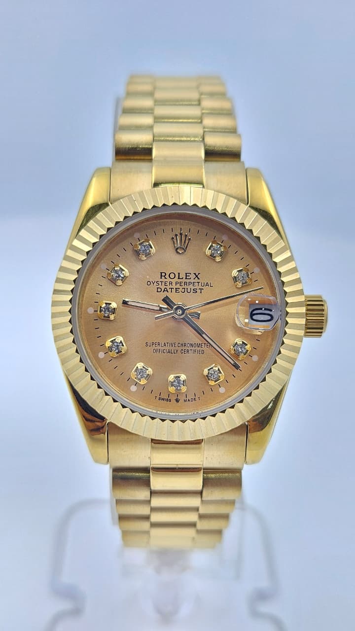 Rolex Datejust Yellow Gold Yellow Dial Oyster Chain Automatic