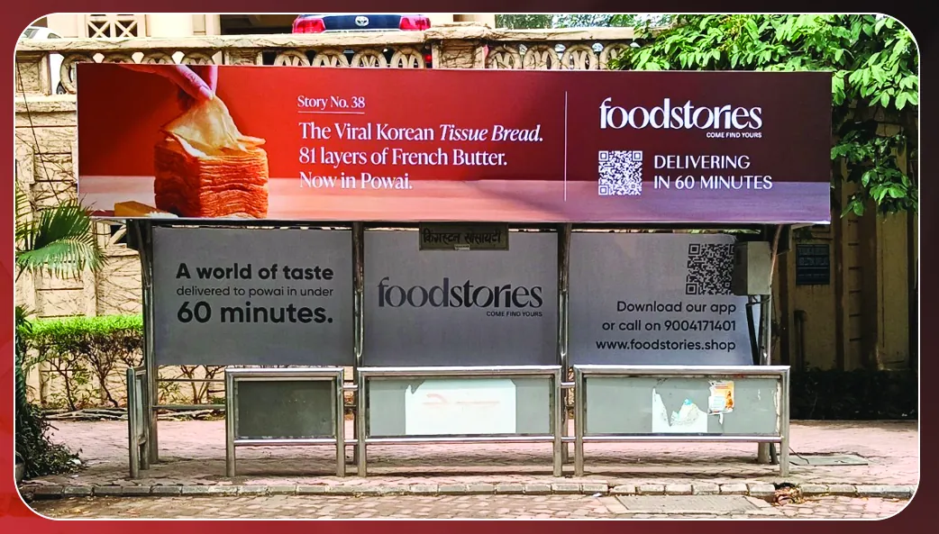 Full Foodstories bus shelter at Powai with the header and all back panels branded