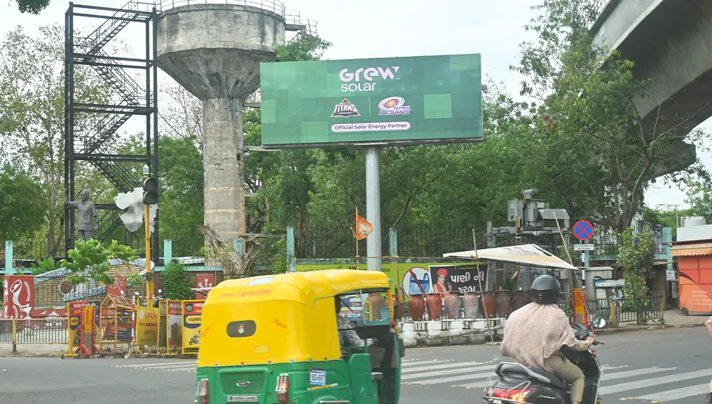 GREW Solar hoarding in Ahmedabad carrying the official solar energy partner status