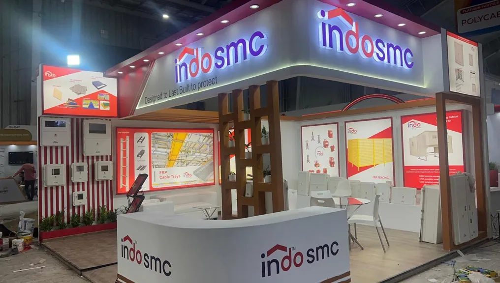 IndoSMC exhibition stand with the illuminated brand fascia and product wall