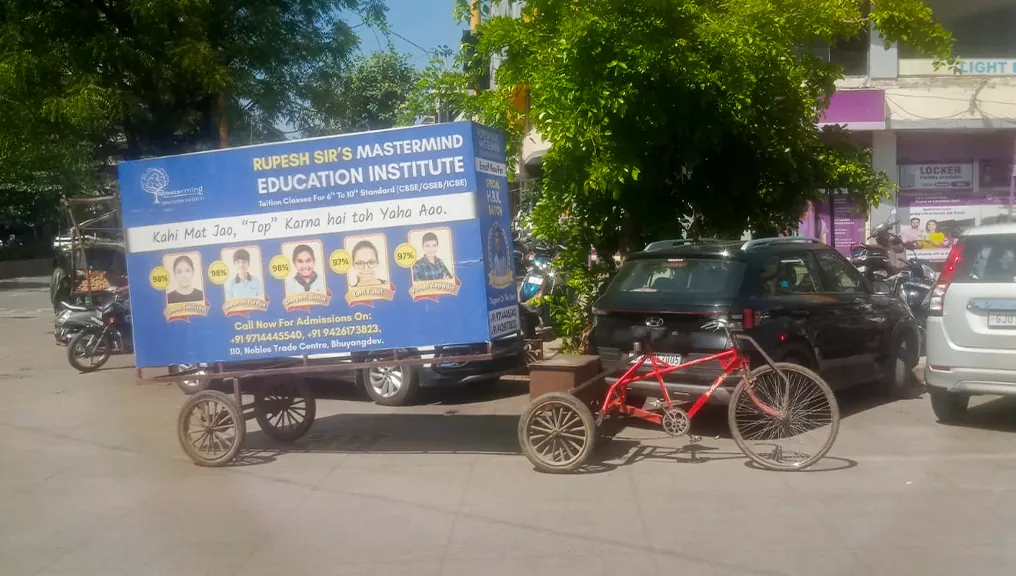 Tuition institute cart branding photographed at Bhuyangdev, Ahmedabad