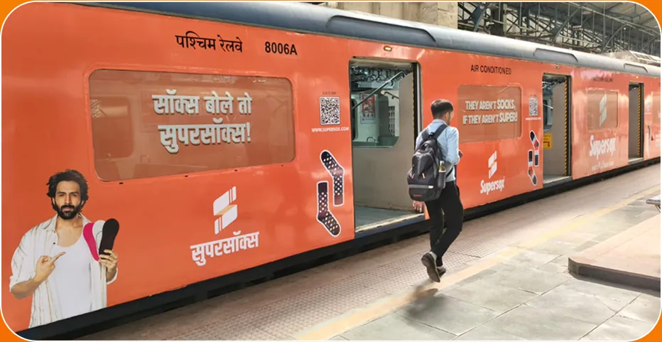 The Hindi Supersox train wrap as a commuter boards