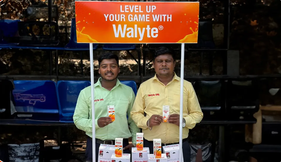 Walyte ORS branded sampling canopy at the cricket ground with the promoter team